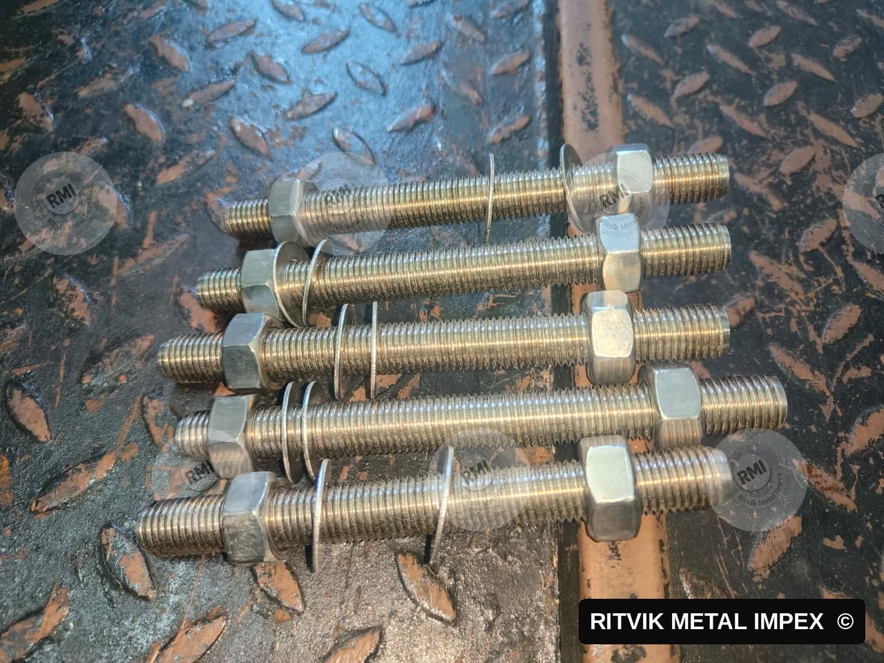 Stainless steel stud bolts with heavy hex nuts and washers